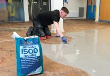 F BALL and Co high-performance water-mix smoothing underlayment, used alongside pressure-sensitive vinyl adhesive