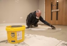 Working over raised-access floor panels with F Ball and Co’s cement-based primers