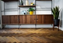 The Solid Wood Flooring Company elevates affordable housing with rustic oak herringbone parquet flooring