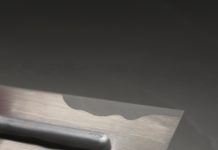 Dampproof, smooth and level the subfloor